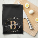 Trendy Girly Black Golld Name Monogram Script Tea Towel<br><div class="desc">Girly, trendy, elegant, modern, black gold monogram initial name script custom personalised monogrammed kitchen towel. Featuring a monogram initial and a girly name script in a hand lettered calligraphy swash tail font and dotted circle frame around your monogram. Perfect feminine gift for sister, mother, girlfriend, birthday, wedding, bridal shower, sweet...</div>
