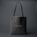 Trendy Minimalist Modern Black Script Name Tote Bag<br><div class="desc">A simple stylish custom name typography design in a casual script font in striking monochromatic black and white. The perfect item for the minimalist. An on trend bespoke gift or accessory for any occasion. Debra Valencia, a visionary surface pattern artist, product designer and entrepreneur with a passion for world travel,...</div>