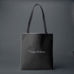 Trendy Minimalist Modern Black Script Name Tote Bag<br><div class="desc">A simple stylish custom name typography design in a casual script font in striking monochromatic black and white. The perfect item for the minimalist. An on trend bespoke gift or accessory for any occasion. Debra Valencia, a visionary surface pattern artist, product designer and entrepreneur with a passion for world travel,...</div>