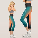 Trendy Name Dark Teal To Orange  Gradient Capri Leggings<br><div class="desc">These cool trendy capri leggings, perfect for the sport enthusiast who loves a minimalist design have a sleek dark teal gradient on the front and a vibrant orange gradient on the back, these leggings are as stylish as they are functional. Customise your leggings with a chic white handscript name on...</div>
