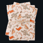 Trendy Western Cowboy Aesthetic Christmas Pattern Wrapping Paper Sheet<br><div class="desc">Add a rustic twist to your holiday gift-giving with these Trendy Western Cowboy Aesthetic Christmas Pattern Wrapping Paper Sheets. Featuring a unique design that blends classic Christmas elements with a stylish Western cowboy theme, this wrapping paper is perfect for those who love a bit of country flair. The pattern showcases...</div>