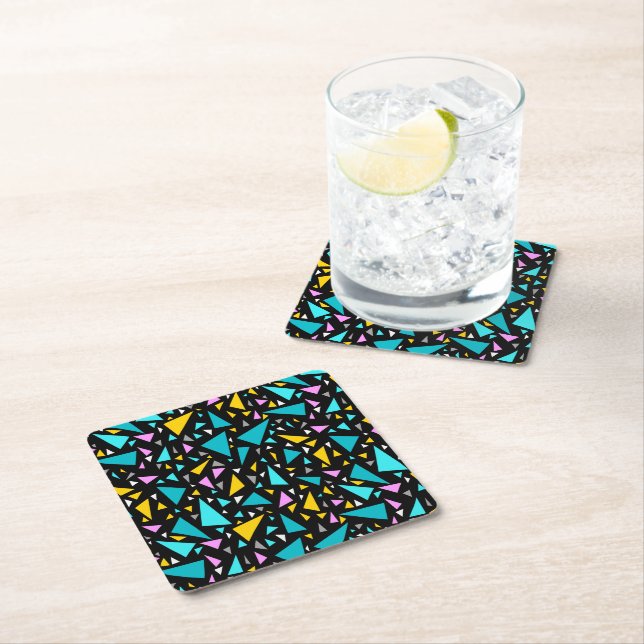 Triangles blue yellow colours on black background  square paper coaster (Insitu)