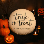 Trick or Treat Round Pillow | Happy Halloween<br><div class="desc">Add a spooky-chic touch to your Halloween decor with this Trick or Treat Happy Halloween Round Pillow! Featuring elegant hand-lettered typography, this cosy pillow is perfect for haunted living rooms, witchy bedrooms, or festive porches. Ideal as a seasonal accent piece or a thoughtful Halloween gift, it adds just the right...</div>