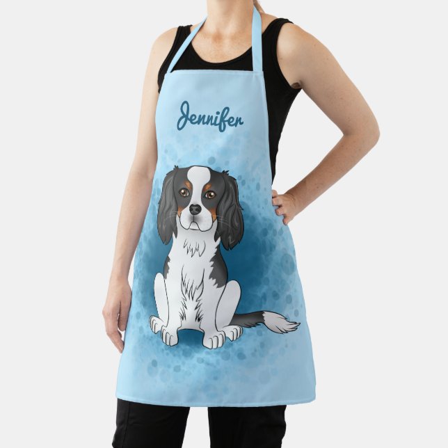 Tricolor Cavalier King Charles Spaniel Dog On Blue Apron (Insitu)