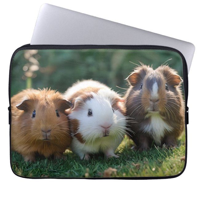 "Triple Squeak: Trio of Adorable Baby Guinea Pigs Laptop Sleeve (Front)