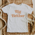 TRIXIE Retro Groovy 70's Big Brother Announcement Baby T-Shirt<br><div class="desc">This big brother announcement shirt features a groovy retro 70's themed font and orange colouring. It's the perfect way to announce a new member to the family and the colours are totally editable! Click 'customise further' to change the colours to your liking. 💜</div>