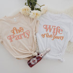 TRIXIE Retro Wife of the Party Bachelorette Group T-Shirt<br><div class="desc">This 'the party' bachelorette t shirt features a retro 70's themed font in blush and orange colouring. Order the white 'wife of the party' option for the bride-to-be and the coordinating orange 'the party' shirts for your bachelorette group. Colours are editable! Click 'edit design' to create your own colours.</div>