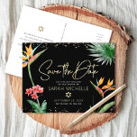 Tropical Bat Mitzvah Save Date Black Gold Floral Invitation Postcard<br><div class="desc">Make sure all your friends and relatives will be able to celebrate your daughter’s milestone Bat Mitzvah! Send out this chic, personalised “Save the Date” announcement postcard. Stylish, stunning, colourful, tropical watercolor birds of paradise flowers, faux gold handwritten script, Star of David and glitter dots, along with modern sans serif...</div>