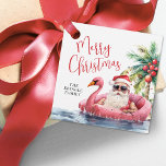 Tropical Beach Merry Christmas Favour Tags<br><div class="desc">Celebrate the season with this festive and playful favour tag, perfect for adding to gifts, party favours, and more. The design features a laid-back Santa in sunglasses lounging in a pink flamingo floaty, surrounded by ocean waves and tropical vibes—bringing a fun twist to your coastal Christmas celebration. "Merry Christmas" appears...</div>