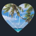 Tropical Beach Thank You Wedding Favour Heart Sticker<br><div class="desc">Send your guests home with a tropical touch using our Tropical Beach Thank You Wedding Favour Heart Sticker. Featuring a serene palm tree and beach design, this heart-shaped sticker adds a breezy, island vibe to your wedding favours. Customise these "Thank You" stickers with your names and wedding date. Perfect for...</div>
