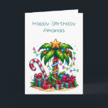 Tropical Christmas Palm Tree Card<br><div class="desc">Birthday card with a seasonal holiday image. A tropical palm tree decorated in festive lights with a star on top. A giant red and white candy cane sticking out of the sand. Gifts under the tree. Whimsical and fun.</div>