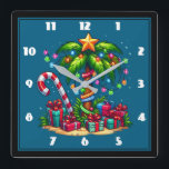 Tropical Christmas Palm Tree Square Wall Clock<br><div class="desc">A clock with a seasonal holiday image. A tropical palm tree decorated in festive lights with a star on top. A giant red and white candy cane sticking out of the sand. Christmas presents under the tree. Whimsical and fun.</div>