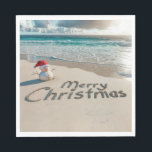 Tropical Christmas Snowman On a Beach Napkin<br><div class="desc">A small sand snowman wearing a Santa hat stands on a sandy beach with "Merry Christmas" written in the sand</div>