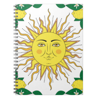 Tropical citrus lemon fruits with flowers frame an notebook