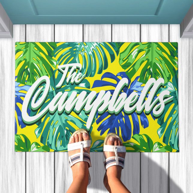 Tropical Family Name Green Yellow Palm Leaves Doormat (Tropical leaves doormat in yellow & green, edit script to say your family name)