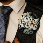 Tropical Green Brown Leaves Text Hard of Hearing 6 Cm Round Badge<br><div class="desc">Another tropical hard-of-hearing badge by JessicaAmber! This button features the slogan 'Hard of Hearing' in a bold font, surrounded by a pattern of green and brown jungle leaves. You can edit the text as needed. A great gift for your father who wears hearing aids. ⭐ For more special needs pins,...</div>
