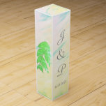 Tropical Green Leaves Watercolor Monogram Wine Box<br><div class="desc">Romantic splash of soft pink, green, yellow, blue tropical watercolor wash with green leaves on sides and back of Wedding Favour Wine Boxes. Lovely for your reception favour gifts for wine or champagne bottles tucked inside, or for anniversary or other special occasions. Personalise with the Bride and Grooms First Name...</div>