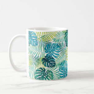 Tropical leaf design featuring green/blue palm and coffee mug