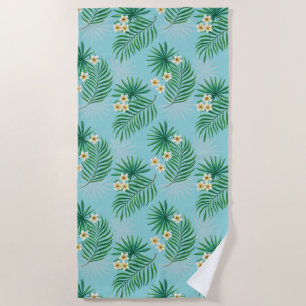 Tropical leaves and flowers beach towel