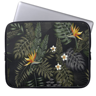 Tropical leaves and flowers in the night style. Se Laptop Sleeve