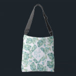 Tropical Leaves Bridesmaid Proposal Gift Crossbody Bag<br><div class="desc">Tropical all over print tote bag for women and girls feature my original watercolor monstera palm leaves in shades of turquoise,  blue and green with your personalisation or monogramed initial in a modern script font. Perfect bridesmaid gift for your destination wedding bridal party. To see more visit www.zazzle.com/dotellabelle.</div>