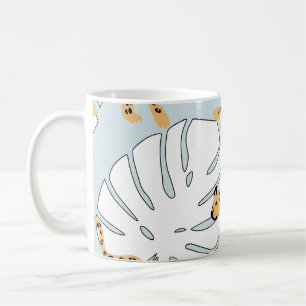 Tropical leopard animal and monstera palm leaves,e coffee mug