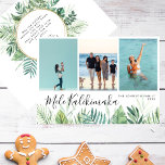 Tropical Mele Kalikimaka Christmas Photo Collage Holiday Card<br><div class="desc">This multi-photo Christmas holiday card is a perfect choice for those who live or are on holiday in the Hawaiian tropics this Christmas season! It features a photo collage of three favourite family photos on the top. Underneath there are your Christmas greetings in a modern whimsical elegant script. Below is...</div>