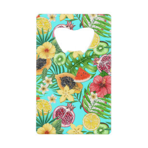 Tropical mix-fruit, flowers and leaves on blue