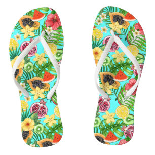 Tropical mix-fruit, flowers and leaves on blue jandals