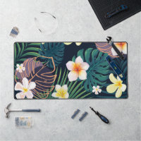 Tropical monstera leaves plumeria flowers