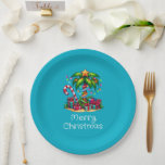 Tropical Palm Tree Merry Christmas Paper Plate<br><div class="desc">Paper plates with a seasonal holiday image. A tropical palm tree decorated in festive lights with a star on top. A giant red and white candy cane sticking out of the sand. Christmas presents under the tree. Whimsical and fun.</div>