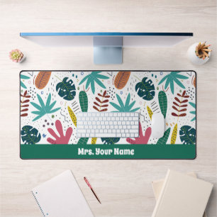 tropical pattern with colourful leaves desk mat