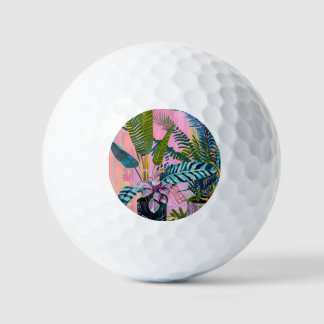 Tropical pink flamingos set against lush green golf balls