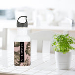 Tropical Pink & Gold Palm Leaves Pattern & Name   532 Ml Water Bottle<br><div class="desc">The Tropical Pink & Gold Palm Leaves pattern features a vibrant and exotic design inspired by tropical aesthetics. The colour scheme revolves around shades of pink and gold, creating a luxurious and stylish look. The pattern consists of palm leaves rendered in a variety of sizes and orientations, evoking a sense...</div>