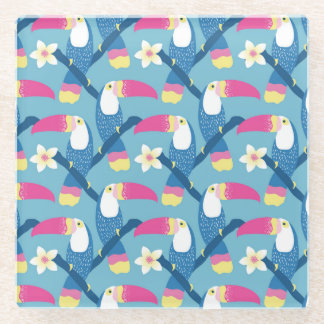 Tropical toucan: vibrant floral pattern. glass coaster
