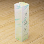 Tropical Watercolor Monogrammed Wedding Wine Box<br><div class="desc">Romantic splash of soft pink, green, yellow, blue tropical watercolor wash Wedding Favour Wine Boxes. All over print is lovely for your reception favour gifts for wine or champagne bottles tucked inside, or for anniversary or other special occasions. Personalise with the Bride and Grooms First Name Initials and Wedding Date...</div>