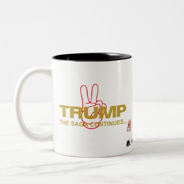 TRUMP 2:  "THE SAGA CONTINUES" Two-Tone COFFEE MUG (Left)