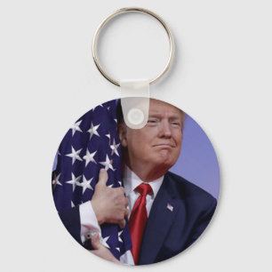 Trump Hugging the American Flag Key Ring
