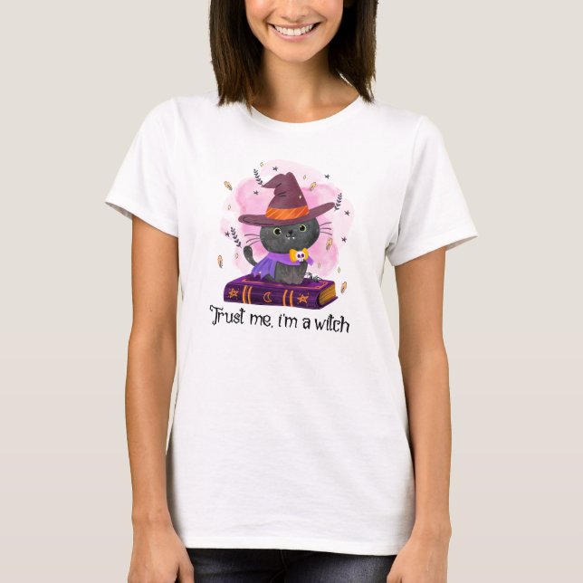 Trust Me I'm A Witch – Witch Cat on Magic Book T-Shirt (Front)
