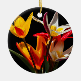 Tulip flowers against black background ceramic tree decoration