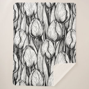 Tulips in black and white sherpa blanket