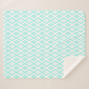 Turquoise and white diamond pattern sherpa blanket