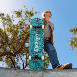 Turquoise blue cool leaf pattern custom name bold skateboard<br><div class="desc">Spread some flair on your city streets with this personalised, custom name skateboard. Modern, trendy, white distressed, edgy typography overlays a turquoise blue ombre leaf foliage damask pattern on a rich, deep teal textured background. Makes a cool and stylish statement every time you surf the pavement. A great gift for...</div>