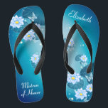 Turquoise Blue Floral Pattern Matron of Honour Jandals<br><div class="desc">This pretty something blue features elegant lotus flowers on the turquoise blue gradient background. Add your wording to easily make your own beautiful wedding flip flops, to add a stylish dose of glam to your wedding day, bachelorette party, or other celebration. ♥Customise it with your wording by using the template fields. ♥ If...</div>