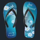 Turquoise Blue Floral Pattern Wedding Just Married Jandals<br><div class="desc">Featuring floral pattern on the turquoise blue background, and wedding words typography, these elegant flip flops are a pretty something blue idea for your wedding. They will add a stylish dose of glam to your wedding day, bachelorette party, or other celebration. ♥Customise it with your wording by using the template fields. ♥ If...</div>