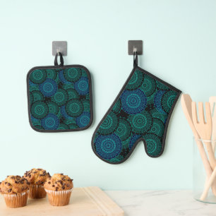 Turquoise blue round mandala on black background oven mitt & pot holder set
