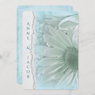 turquoise daisy macro on torn edge paper invitation