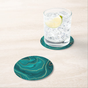 Turquoise liquid marble background with gold round paper coaster