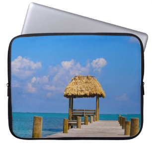 Turquoise ocean and dock laptop sleeve