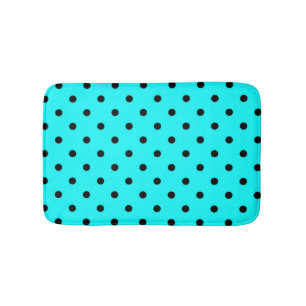 Turquoise polka dot background bath mat